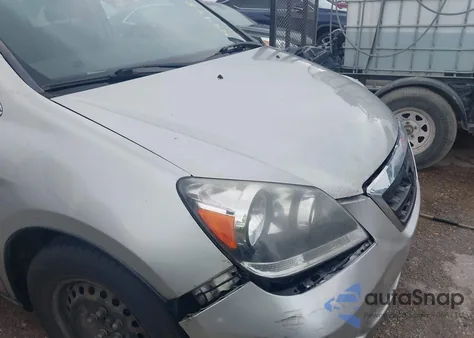 2007 Honda Odyssey Lx z USA, uszkodzony, nr VIN 5FNRL38277B092953